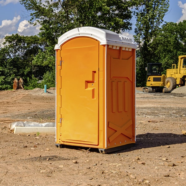 how often are the porta potties cleaned and serviced during a rental period in Alpine MI